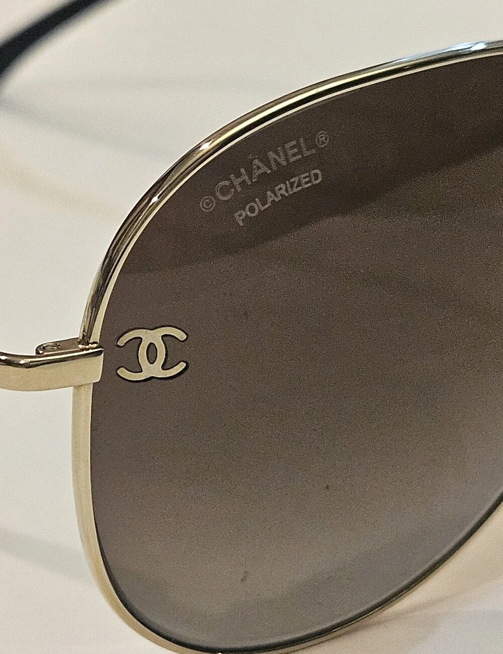 Chanel 4189-T-Q Titanium Polarized Aviator Sunglasses GoldThese are authentic